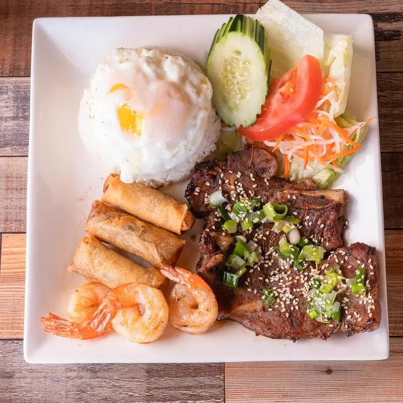58. Grilled Pork Chop & Shrimp, Fried Egg, Egg Roll